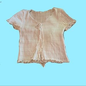 Cute lil white top. Stretchy material size medium but could fit larger:)